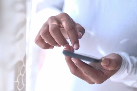 close up of person hand use smart phoneの写真素材