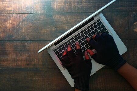 hacker stealing data from laptop, close up .の写真素材