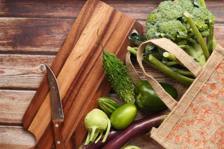 Eco friendly reusable bag with various fresh organic vegetables