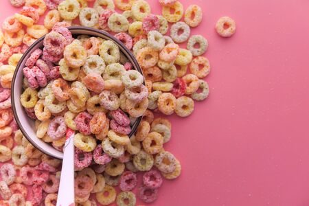 colorful ring corn flakes in a bowl with copy spaceの写真素材