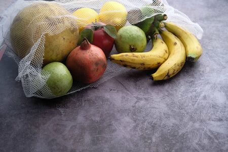 Close up of vegetable in reusable shopping bagの写真素材