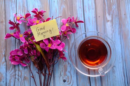 top view of morning tea with flower on table.の写真素材
