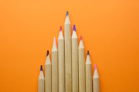 multicolored pencils growing row isolatedの写真素材