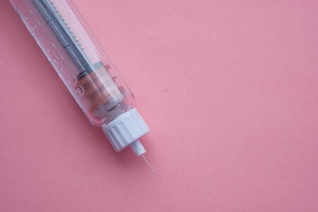 insulin injection pen on color background .の写真素材