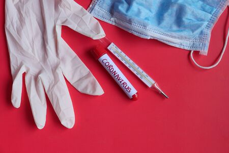 Coronavirus blood test concept. Top view desk in laboratory with pills, test tubesの写真素材