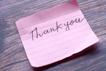 top view of thank you message on white background