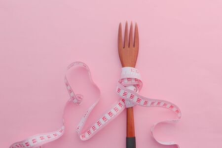 fork and measuring tape for a healthy lifestyle, Diet.の写真素材