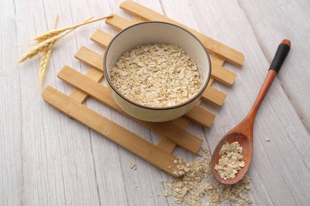 oat flakes in bowl, healthy eating concept.