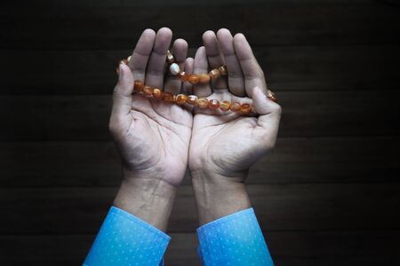 muslim asian man praying with prayer,の写真素材