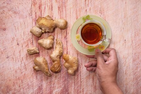 high angle view of ginger tea on table.の写真素材