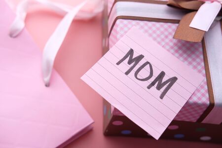 mother day gift on pink background, close up.の写真素材
