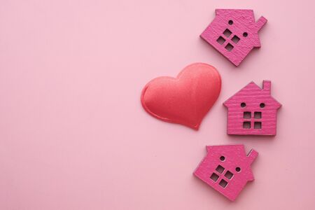 wooden house with heart shape symbol, home finance conceptの写真素材