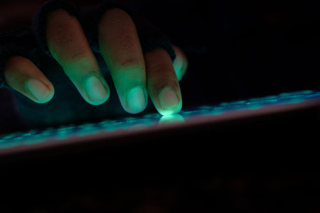 hacker hand stealing data from digital tablet