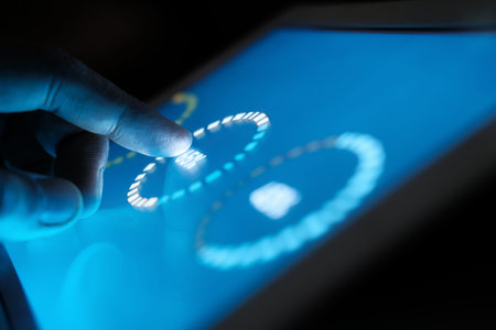person hand analyzing financial data on digital tablet