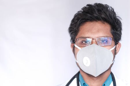 doctor wearing face protective mask against corona virus.の写真素材