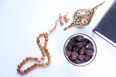 the concept of ramadan, close up of date fruit in a bowlの写真素材
