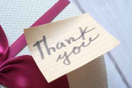 White Sticky Note With Thank You message on giftの写真素材