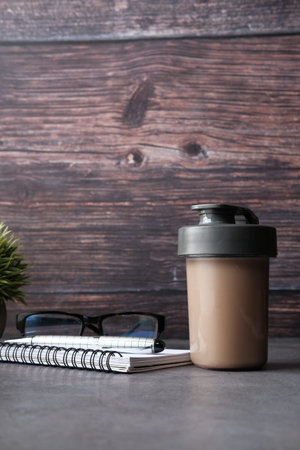 reusable eco coffee cup on table with copy space.