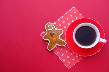 Top view of green tea and crunchy and wholemeal biscuits on red background .の写真素材