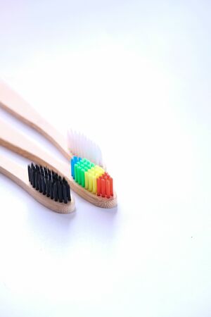 Eco friendly bamboo tooth brush on white backgroundの写真素材