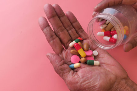 senior women hands taking medicine, close upの写真素材