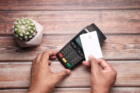 Payment terminal charging from a card, contactless payment.の写真素材