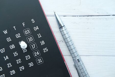deadline concept with push pin on calendar date with copy spaceの写真素材