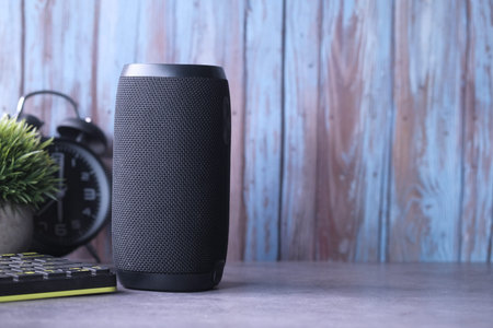 smart speaker and office suppliers on table