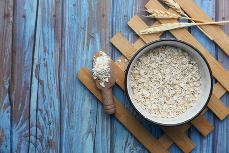 high angle view of oats flakes on in a bowl on table