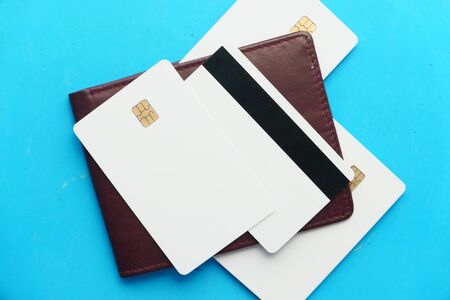close up of credit cards on wallet on blue backgroundの写真素材