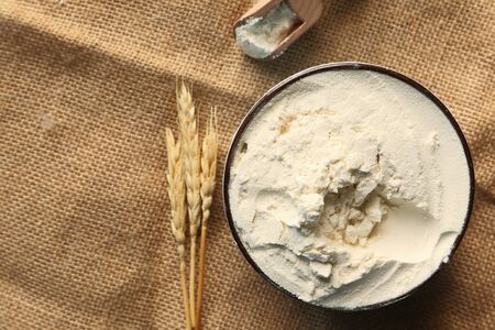 Production of wheat and rye flour on white deskの写真素材