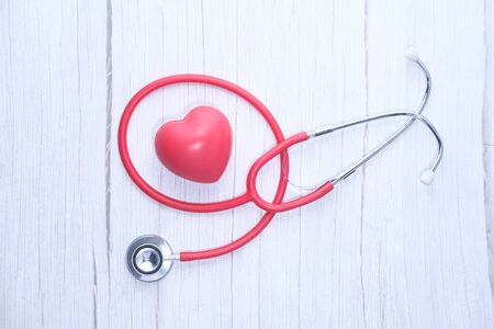 heart shape symbol and stethoscope on white backgroundの写真素材