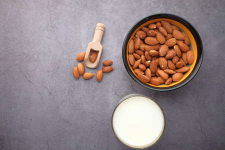almond nut and milk on table top downの写真素材