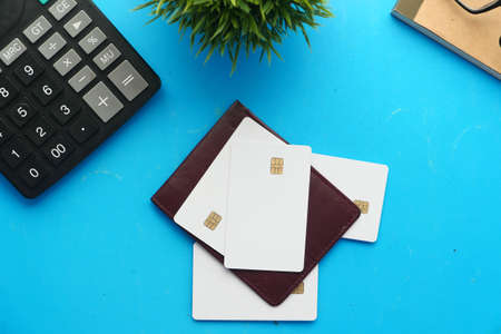 close up of credit cards on wallet on blue backgroundの写真素材