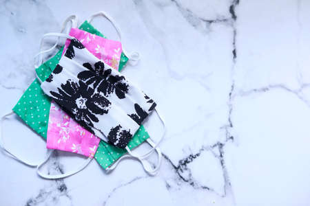 homemade face masks on tiles background top downの写真素材