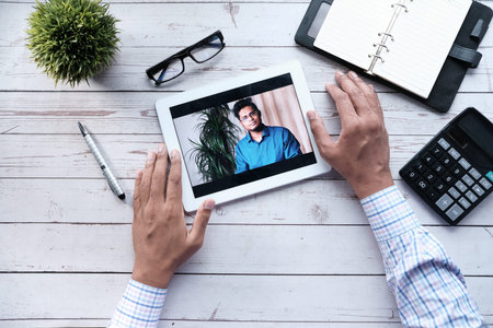 businessman working in video conference, close up.