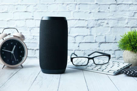smart speaker and keyboard on white backgroundの写真素材