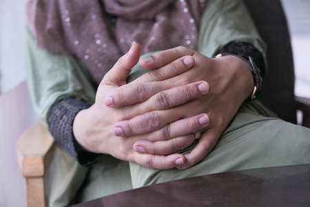 Close-Up fingernail of women sitting indoor.の写真素材