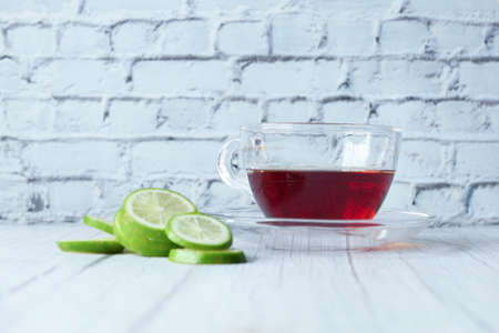 lemon tea on wooden background with copy spaceの写真素材