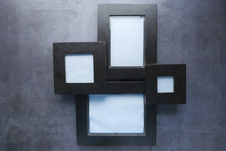 top view of empty frame on black background .