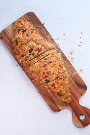 top view of fresh baked brow bread on table.