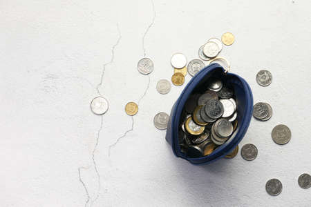 top view of coins in a small leather bagの写真素材