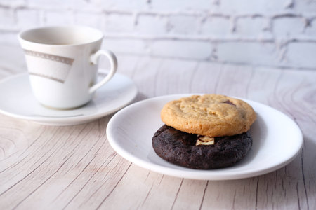 Close up of cookies and tea on table