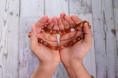 Close up of muslim women hand praying.の写真素材