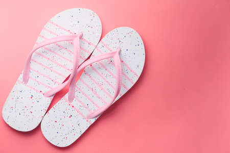 colorful sandals on pink background top downの写真素材