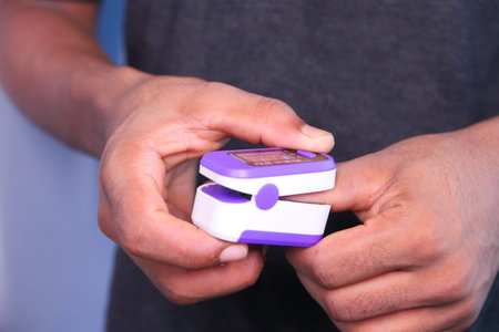 close up of patient using pulse oximeter