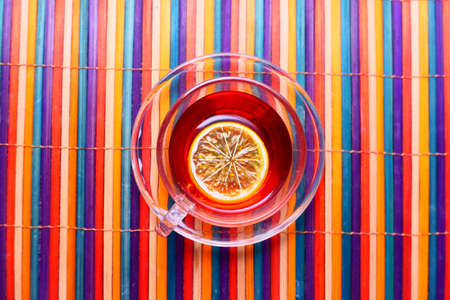 Top view of lemon tea on table clothの写真素材