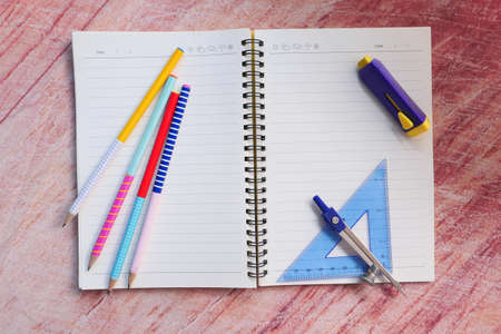 Top view of school suppliers on table wth copy space.の写真素材