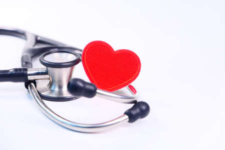 heart shape symbol and stethoscope on white backgroundの写真素材