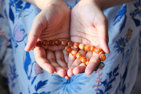 Close up of muslim women hand praying at ramadan